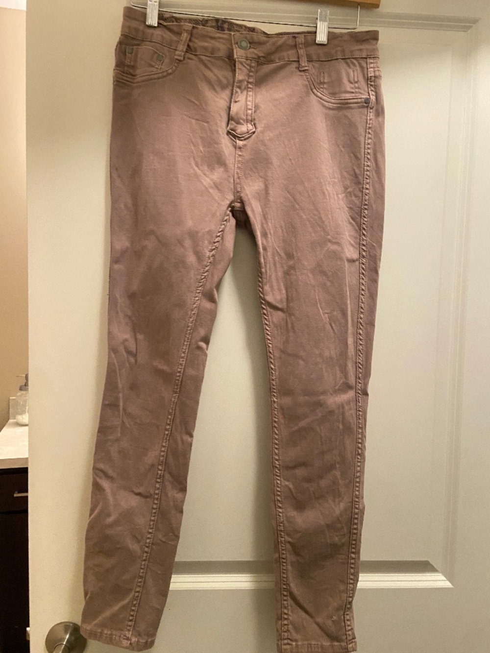 Snake skin reversible jeans.